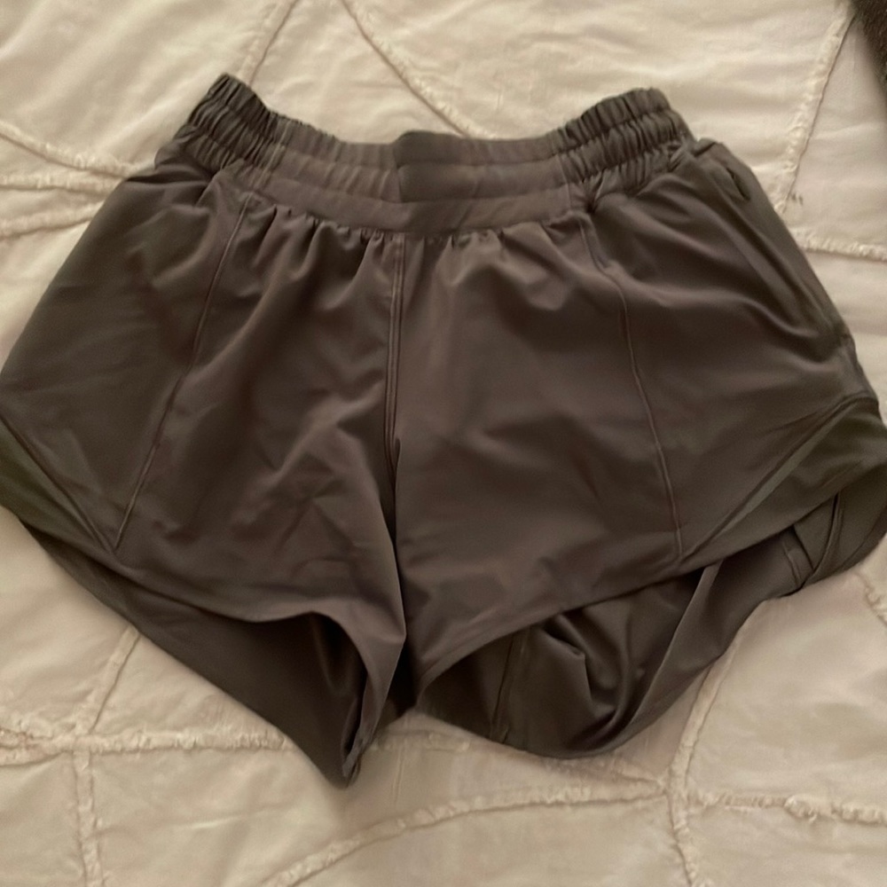 4 tall dark green lululemon hotty hot shorts!